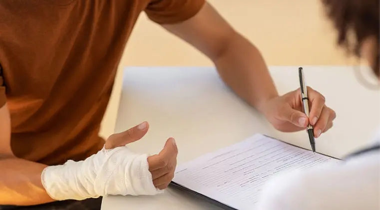 Injured man reviewing document